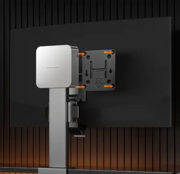 A9 Max mini PC hidden behind monitors